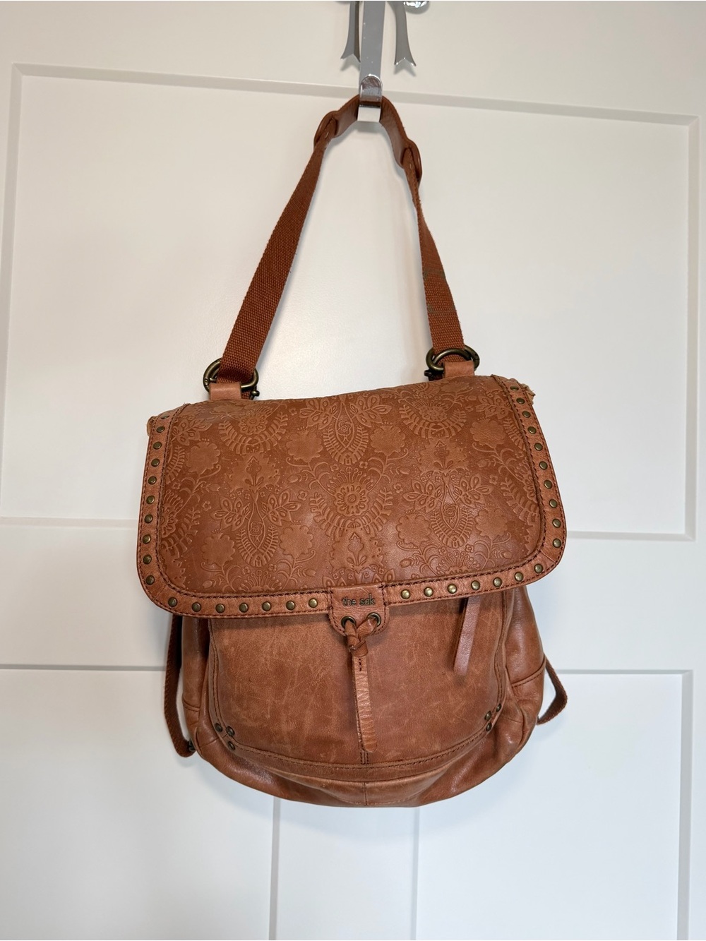 The Sak Brown Embossed Floral Leather Backpack Purse